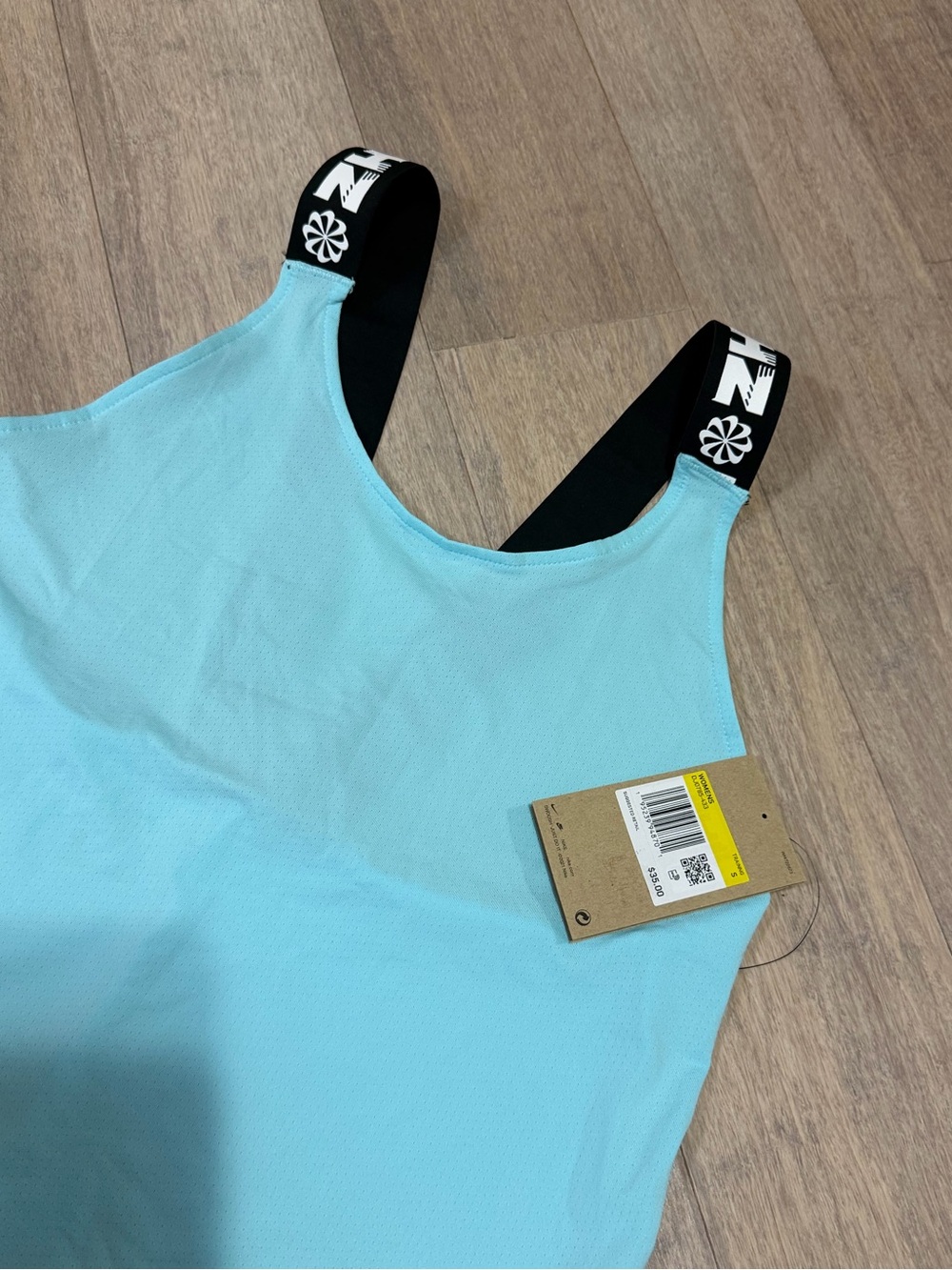 NIKE Women's Light Blue Tank with Black Logo Straps